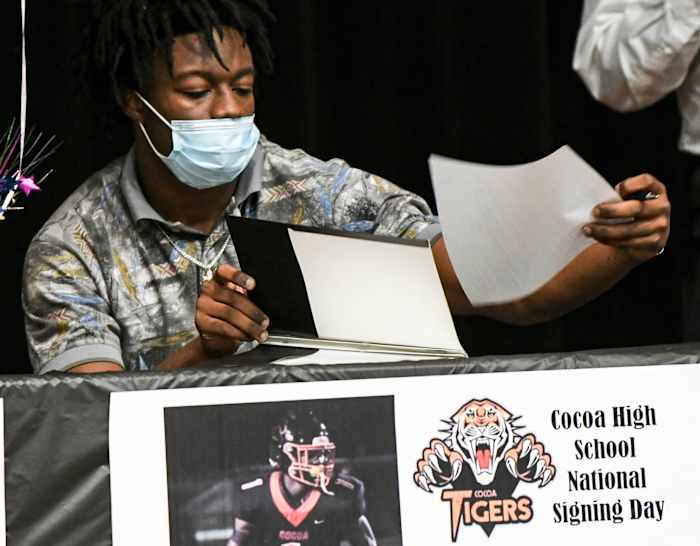 Kionte Curry signs his letter of intent during Signing Day at Cocoa High School on Feb. 3, 2021.